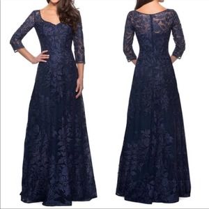 Beautiful deep blue evening gown with embroidered lace throughout.